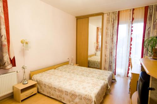 Ένα ή περισσότερα κρεβάτια σε δωμάτιο στο VGH accommodation services