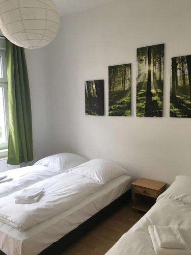 Un ou plusieurs lits dans un hébergement de l'établissement Hotel Markgraf Leipzig