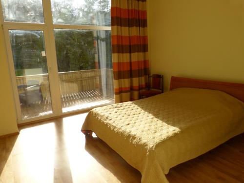 Postel nebo postele na pokoji v ubytování Viva Apartment - Pirita