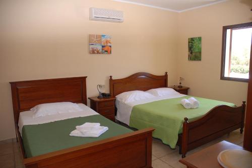 Katil atau katil-katil dalam bilik di Hotel Costa Blu