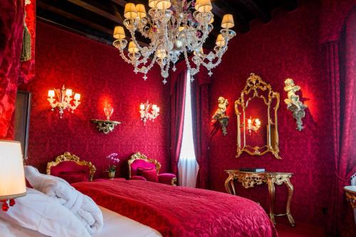 Ein Bett oder Betten in einem Zimmer der Unterkunft Ca Maria Adele