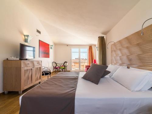 Postel nebo postele na pokoji v ubytování Nichotel