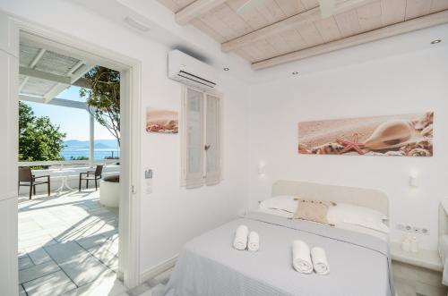 Posteľ alebo postele v izbe v ubytovaní Ostria Hotel
