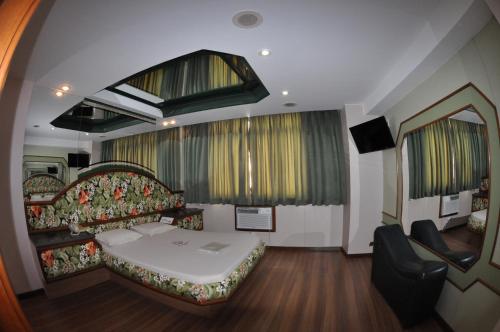 Katil atau katil-katil dalam bilik di Hotel Barão do Flamengo (Adult Only)