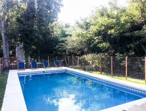 Piscina a El Remanso Chascomus o a prop