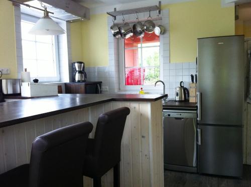 Kuchyň nebo kuchyňský kout v ubytování Haus Hafenecke