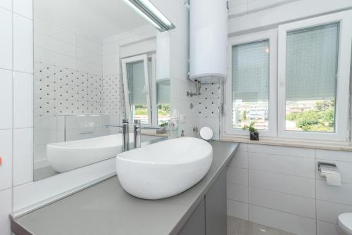Koupelna v ubytování Apartments Radica