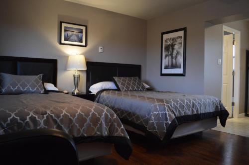 Postel nebo postele na pokoji v ubytování 94 Motel & RV Park