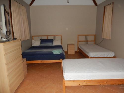 Tempat tidur dalam kamar di Gnaraloo Station - Homestead