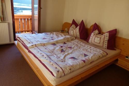 Postel nebo postele na pokoji v ubytování Haus Hönegger