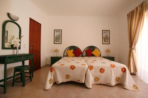 Postel nebo postele na pokoji v ubytování Apartamentos Coral do Vau