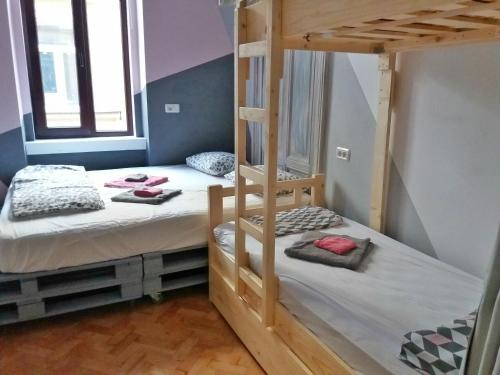 Letto o letti in una camera di Cloud 9 Living