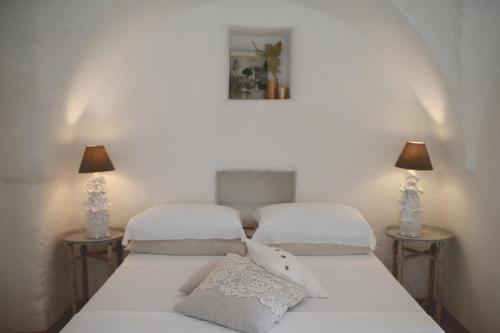 Postel nebo postele na pokoji v ubytování Masseria Eccellenza