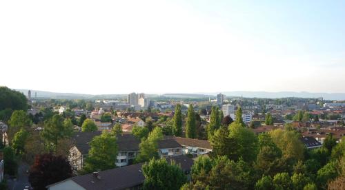 a view of a city with trees and buildings at Hostel 77 Bern in Bern