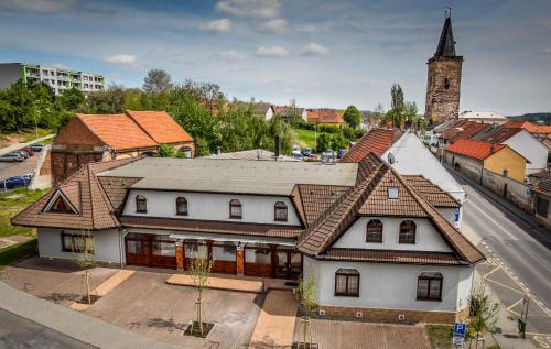 an overhead view of a house in a city at Rozmaryn Rooms & Apartments in Rakovník