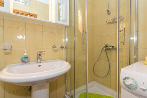 Kúpeľňa v ubytovaní Apartment Nikatoni