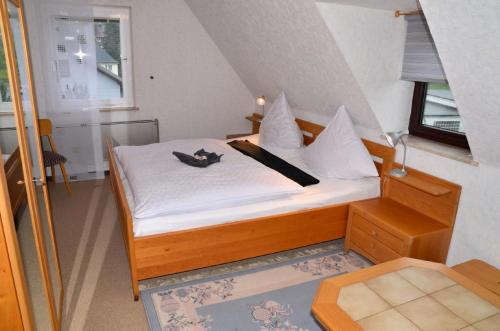 3 Sterne Ferienwohnungen Wachter tesisinde bir odada yatak veya yataklar