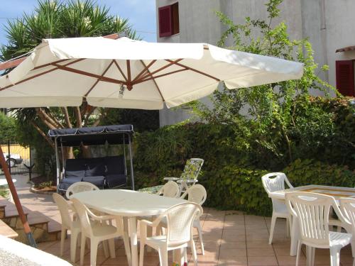 Un patio sau altă zonă în aer liber la Splendida Casa in Salento