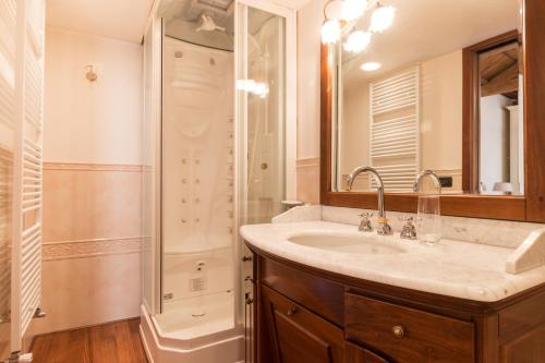 a bathroom with a sink and a shower at Serenissima in Venice