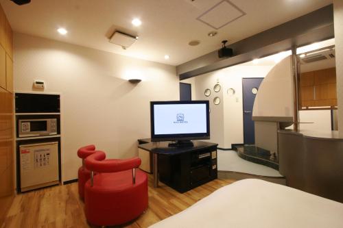 安約馬奇的住宿－豐田南諾亞酒店（僅限成人），相簿中的一張相片