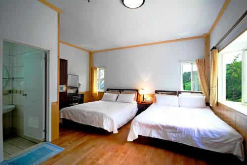 Postel nebo postele na pokoji v ubytování Winlu Vacation Farm