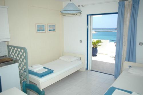 Postel nebo postele na pokoji v ubytování Portobelis Apartments