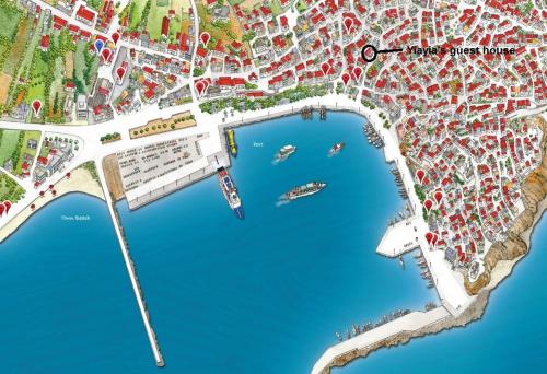 a map of a city with boats in the water at Yiayia's guesthouse in Skopelos Town