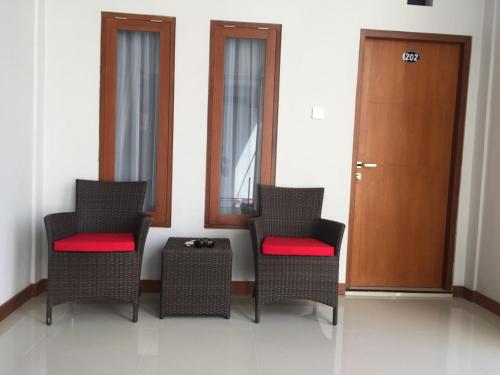 Area soggiorno di Tom Guest House