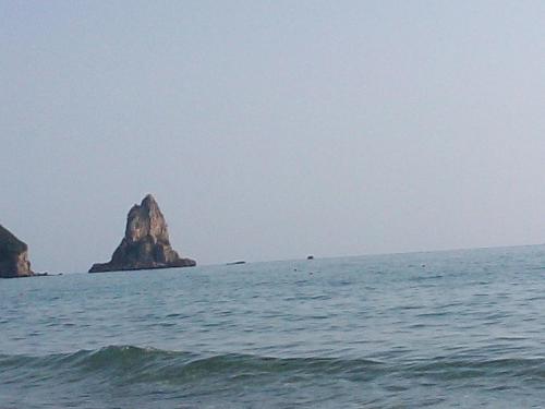 a rock in the middle of the ocean at MARGARITAS' ROOMS in Agios Gordios