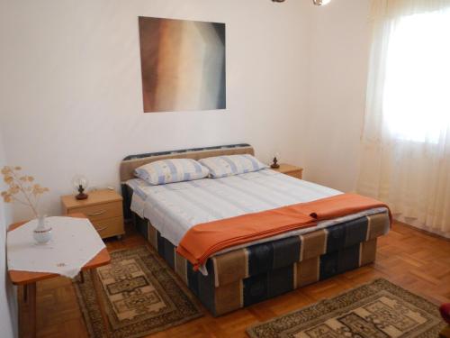 Posteľ alebo postele v izbe v ubytovaní Dinka's Apartment