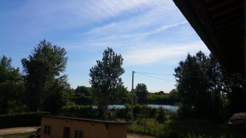 a view of a river from a house at il Chiassetto Agriturismo No Kids in Cascina