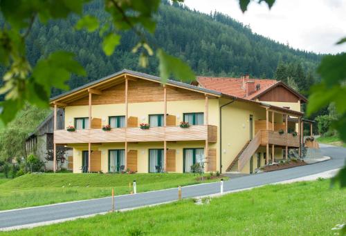 a large building on the side of a road at Gasthof Wachter in Gaal