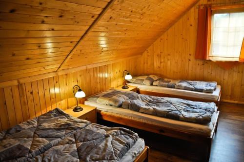 Postel nebo postele na pokoji v ubytování Domki DUET