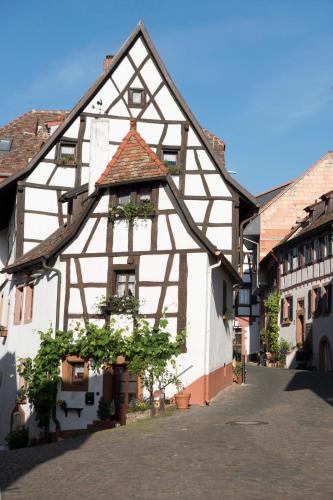 an old building in a town with at Burggarten Appartements Neuleiningen in Neuleiningen