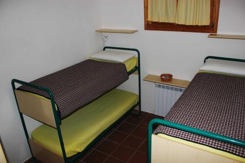 Ένα ή περισσότερα κρεβάτια σε δωμάτιο στο Fascinosa casa sul mare in posizione mozzafiato