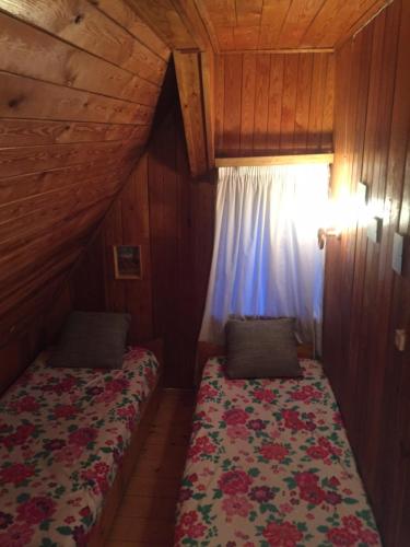 Postel nebo postele na pokoji v ubytování Karwica House