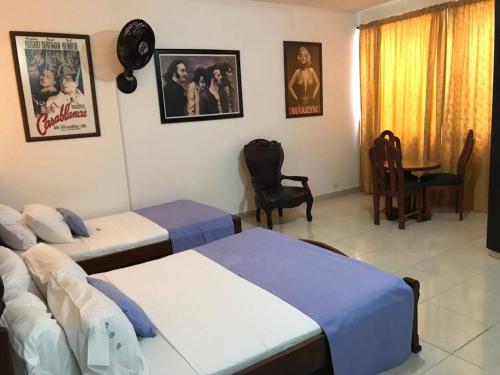 Cama o camas de una habitación en Arco Apartasuites