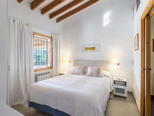 Krevet ili kreveti u jedinici u okviru objekta Villa Finca Luisa para 6 con piscina y vista mar