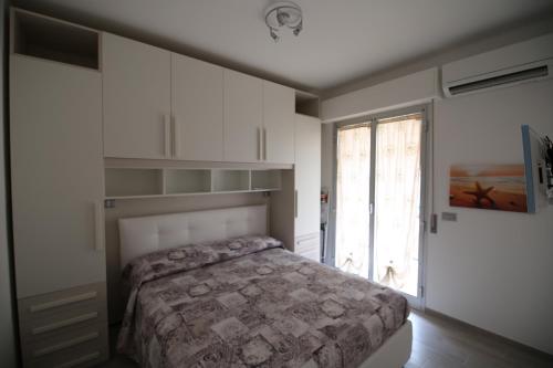 Posteľ alebo postele v izbe v ubytovaní Holiday House Alba