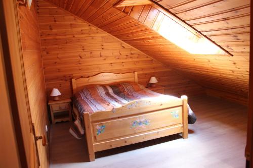 Postel nebo postele na pokoji v ubytování chalets de la Soyotte