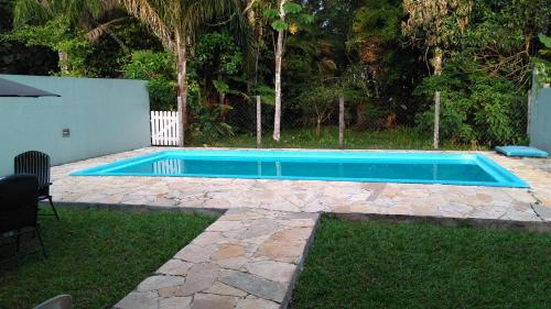 Gallery image of Paraíso de Verão - Disfrute final de semana em Casa Exclusiva com piscina, sinuca e churrasqueira Aluguel para temporada em Riviera de São Lourenço in Bertioga
