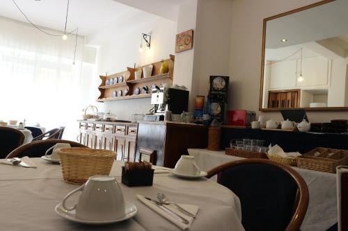 Příslušenství pro přípravu čaje a kávy v ubytování Hotel Viterbo Inn
