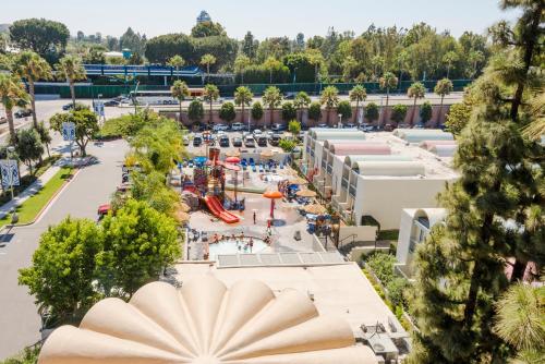 an aerial view of a park with a water park at Howard Johnson by Wyndham Anaheim Hotel & Water Playground in Anaheim