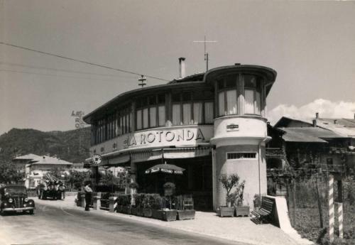 an old black and white photo of a building at La Rotonda in Pergine Valsugana