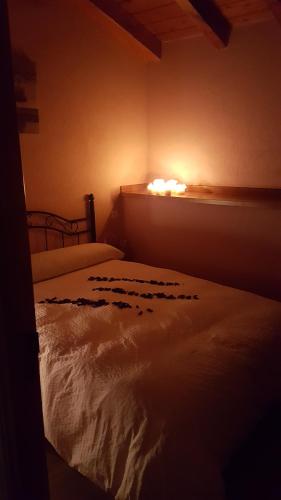 En eller flere senge i et værelse på Loboratorio Rural-La Sonrisa del Aire