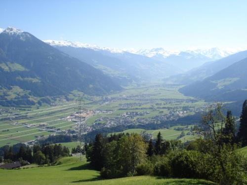 a view of a valley in the mountains at Landhaus Zeller in Fügenberg