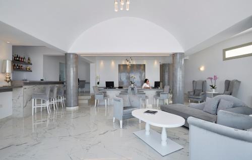 Un lugar para sentarse en Aperanto Suites