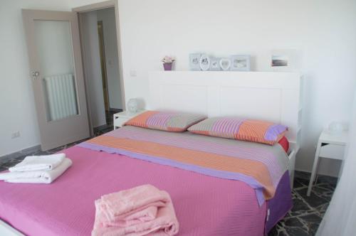 מיטה או מיטות בחדר ב-Jolandahome