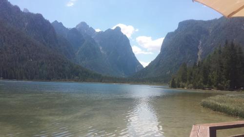 a view of a river with mountains in the background at Casa Monteggia in Dobbiaco