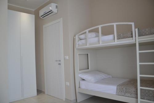Postel nebo postele na pokoji v ubytování B&B Terra d'Oriente